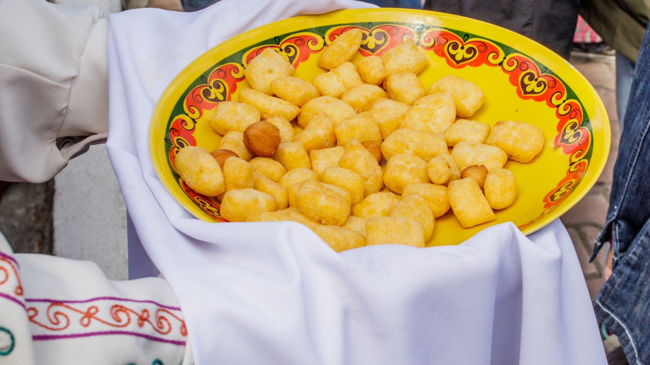 a plate full of a fried dough food 