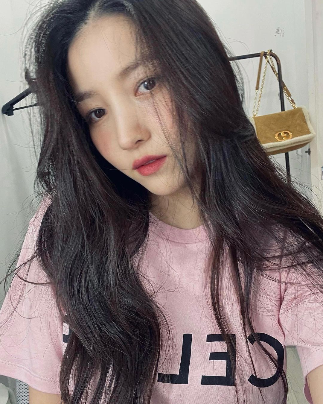 Actress Sowon in pink t-shirt with hair open