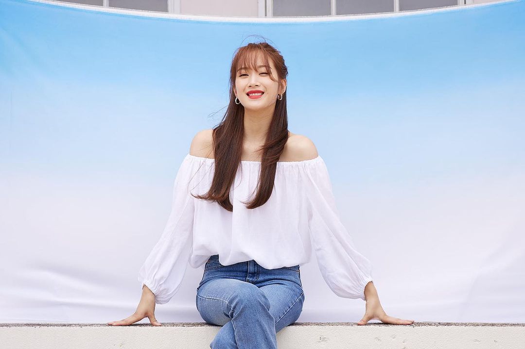 Moon Ga Young in off-shoulder white top and blue jeans 
