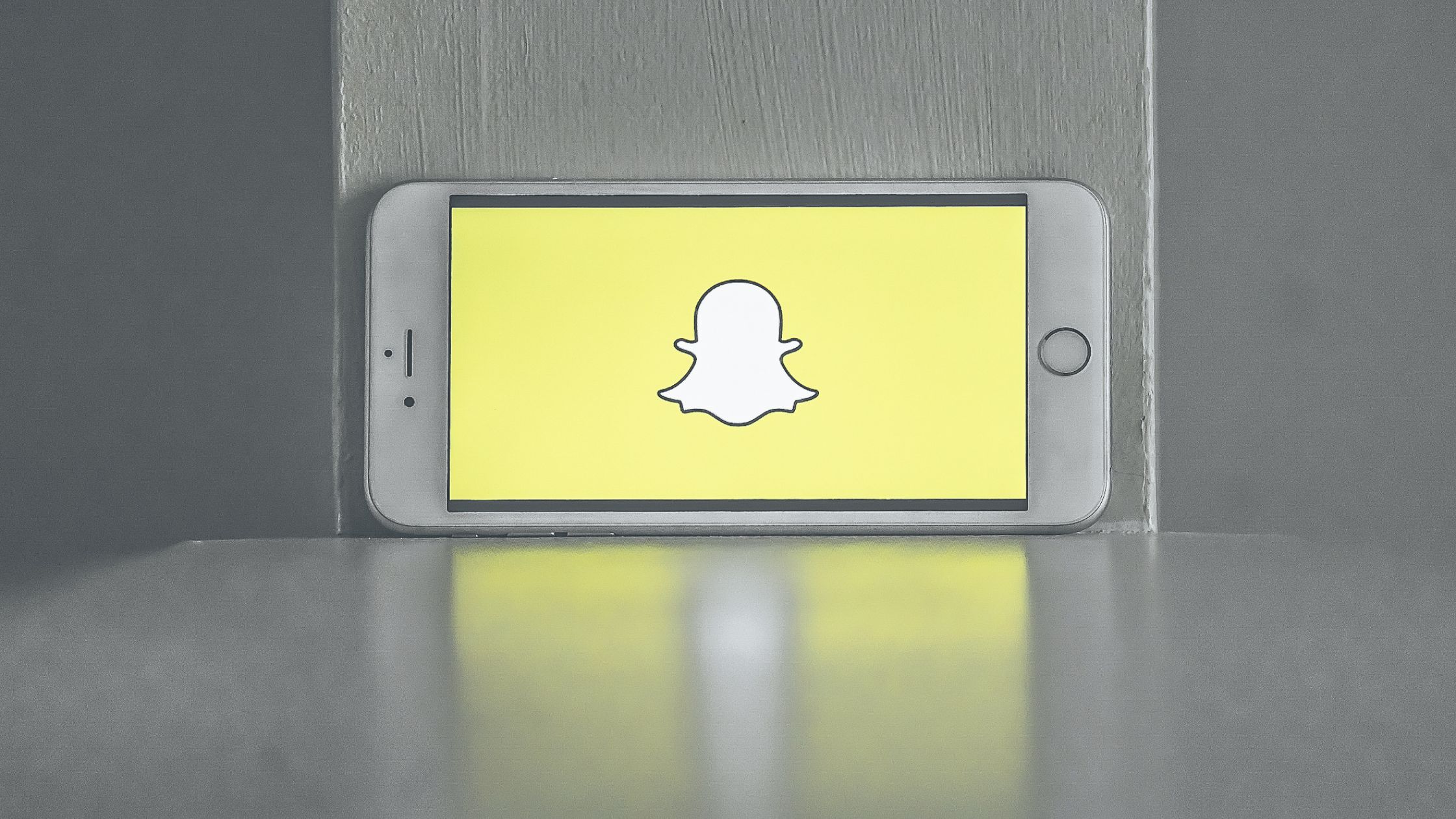 A smartphone with a Snapchat Icon