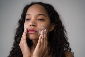 Girl Using Vegan Face Wash to Cleanse Skin