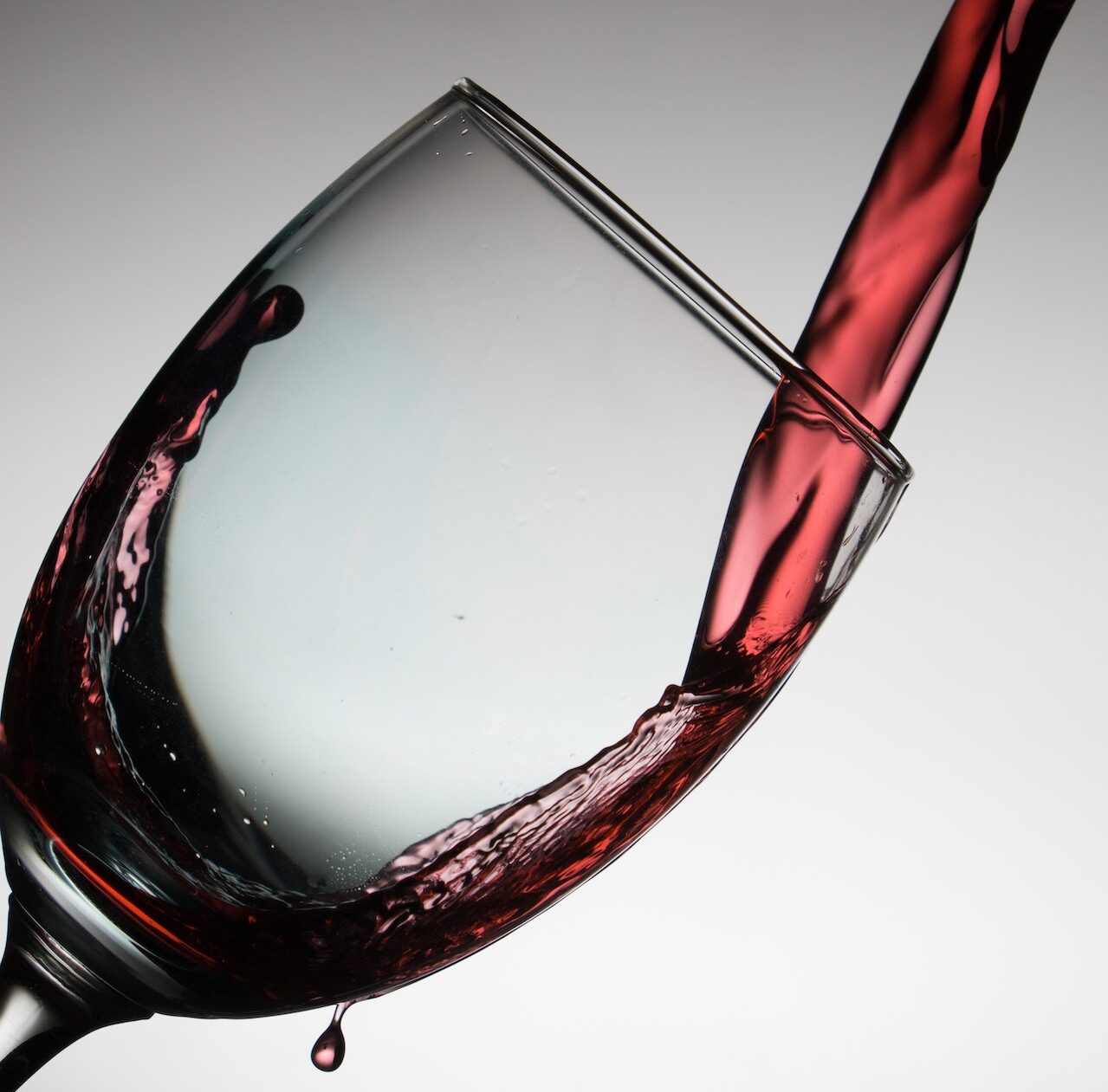 Pouring of Wine in Glass Tumbler