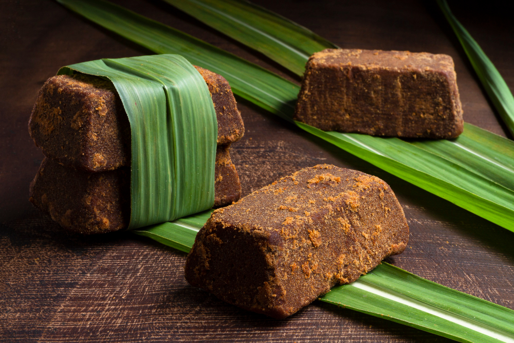 blocks of Palm Jaggery wrapped in banana leaves