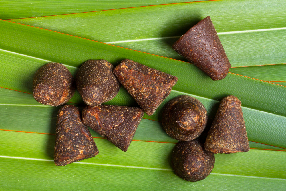 Pieces of Palm Jaggery on Banana Leaves